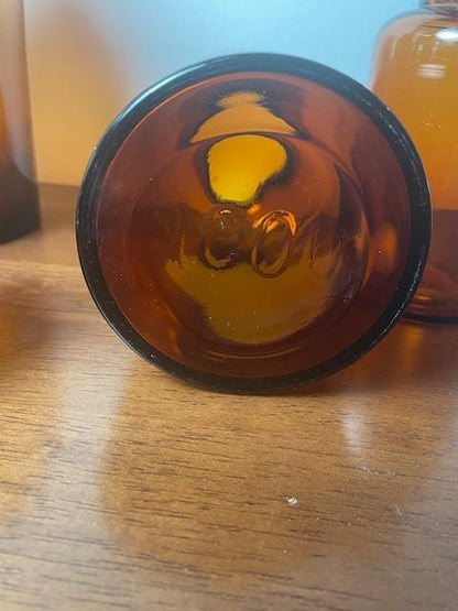 Three Vintage Amber Glass Apothecary Jars With Glass Stoppers